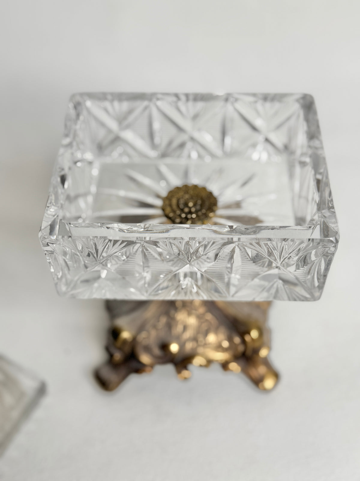 Close-up of the cut glass body of the vintage crystal pedestal box