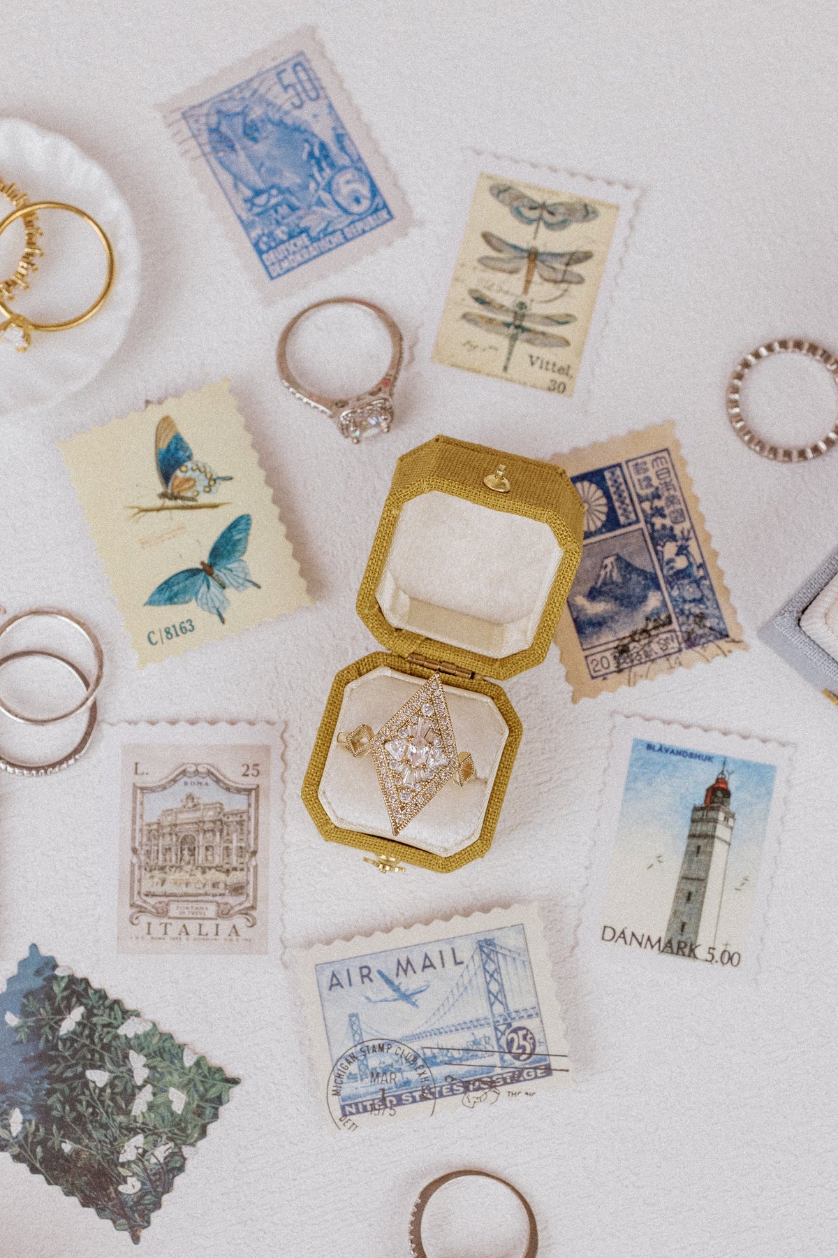 Vintage stamps and rings with an Oro gold Radiant Georgian ring box