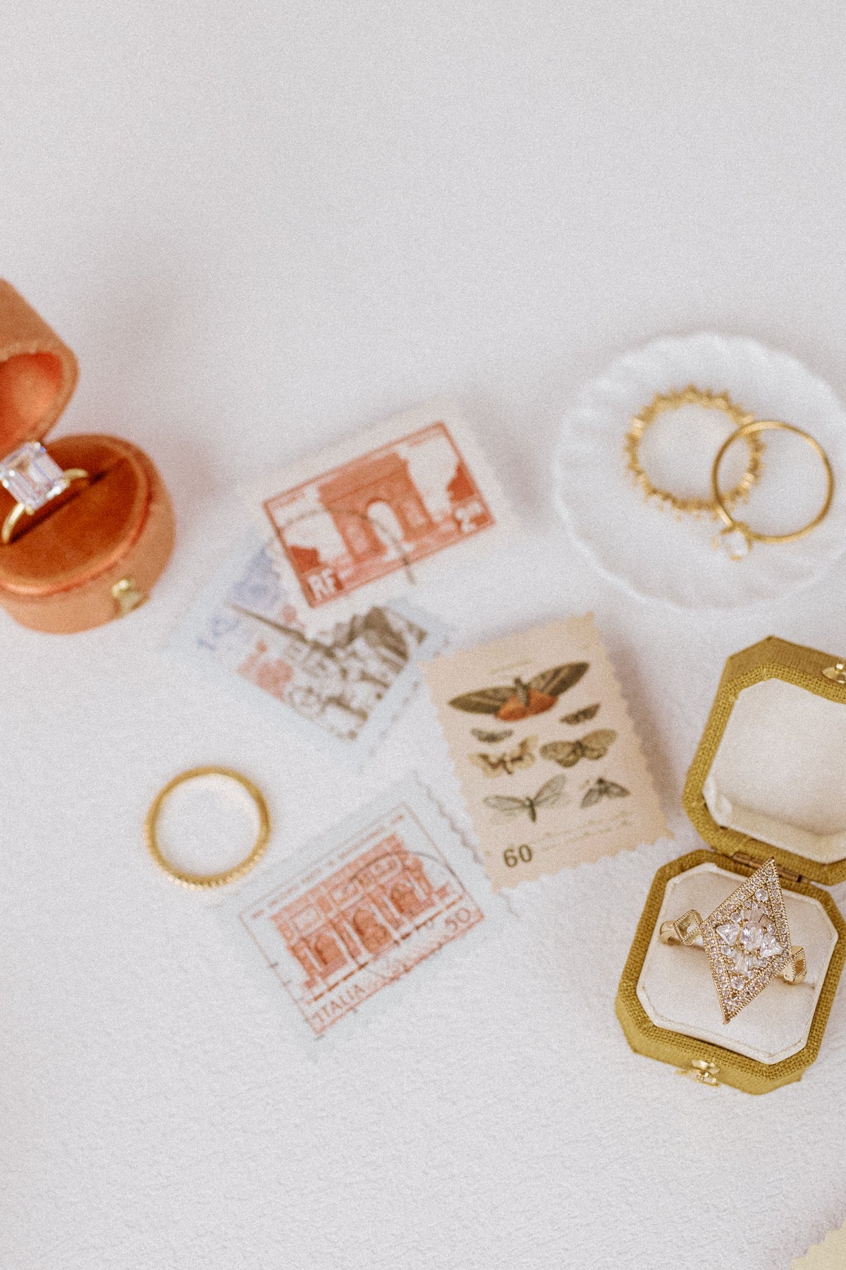Vintage sticker stamps with an orange ring box and gold-tone frame