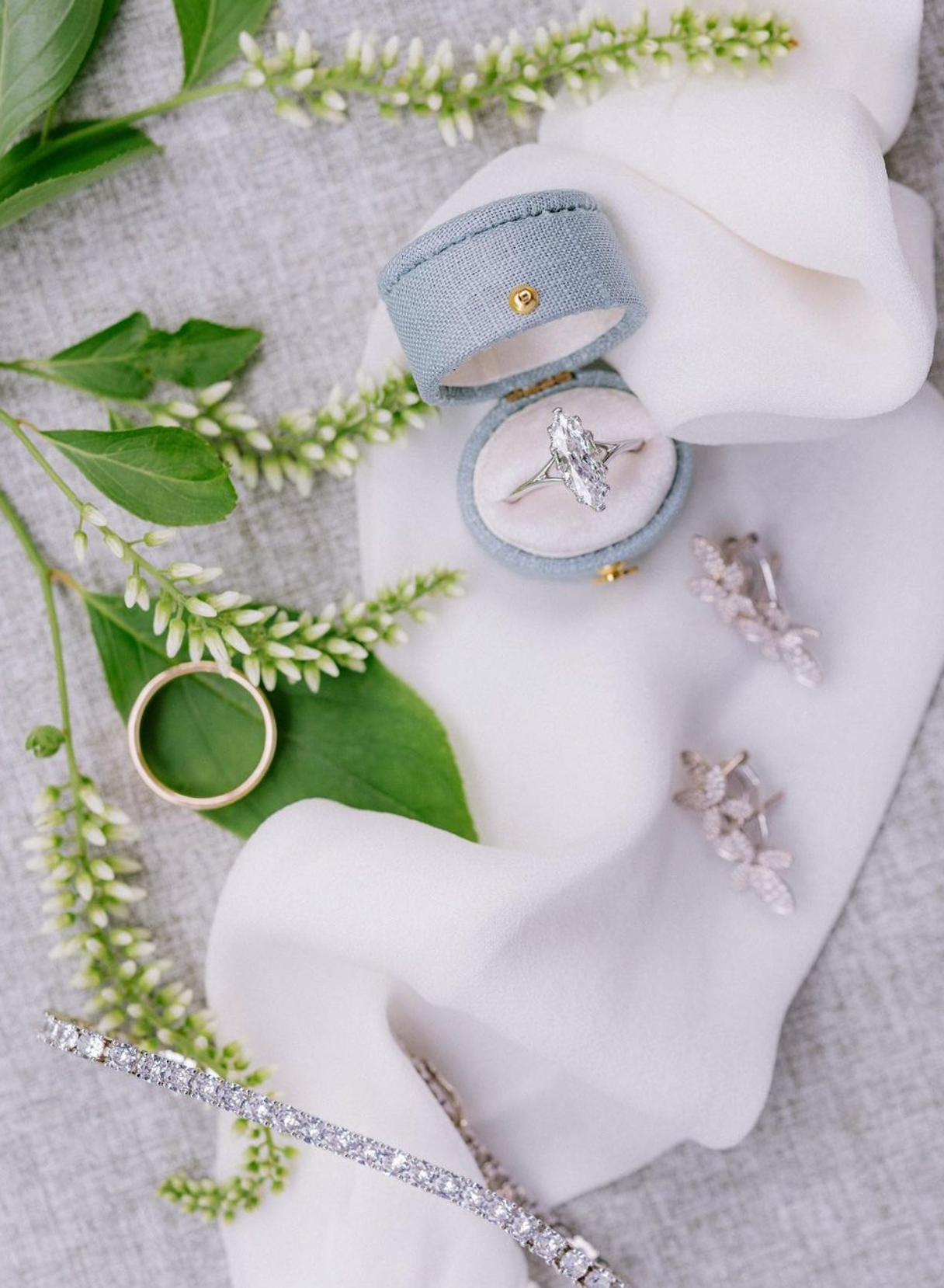 Beautiful wedding ring shot by jose villa featuring the georgian oval ring box in traverse bay blue